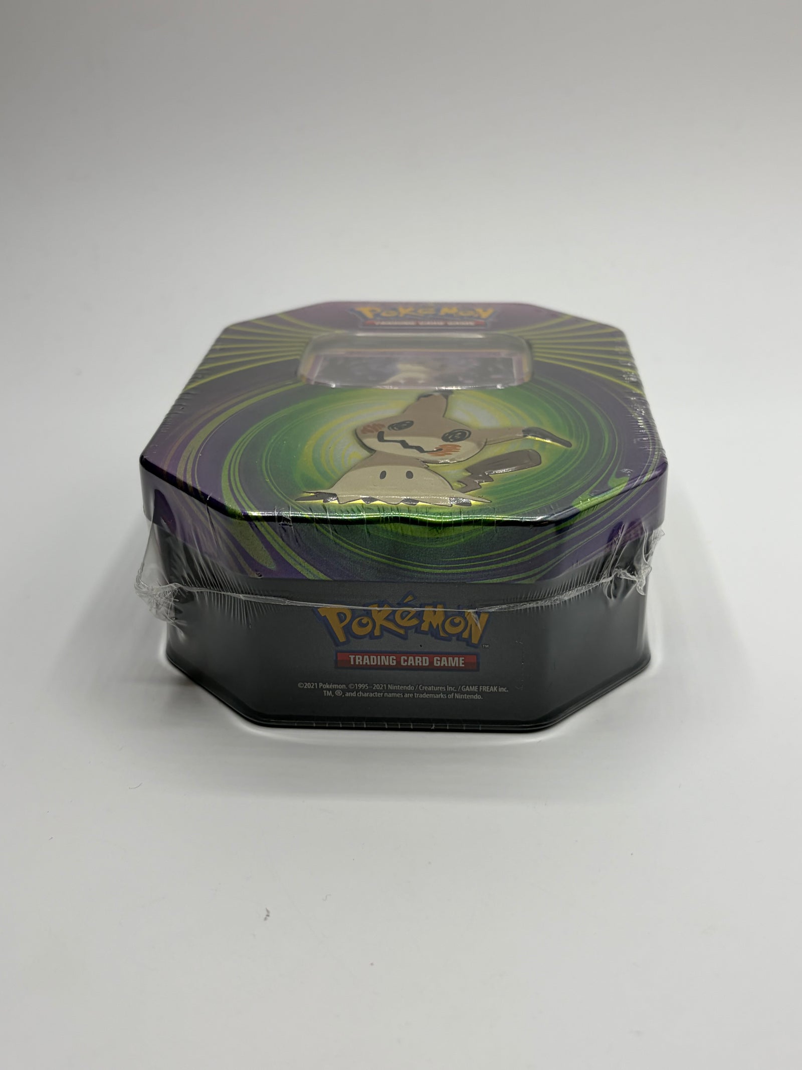 Pokémon Trading Card Game Mighty Mysterious Tin featuring Mimikyu Factory Sealed