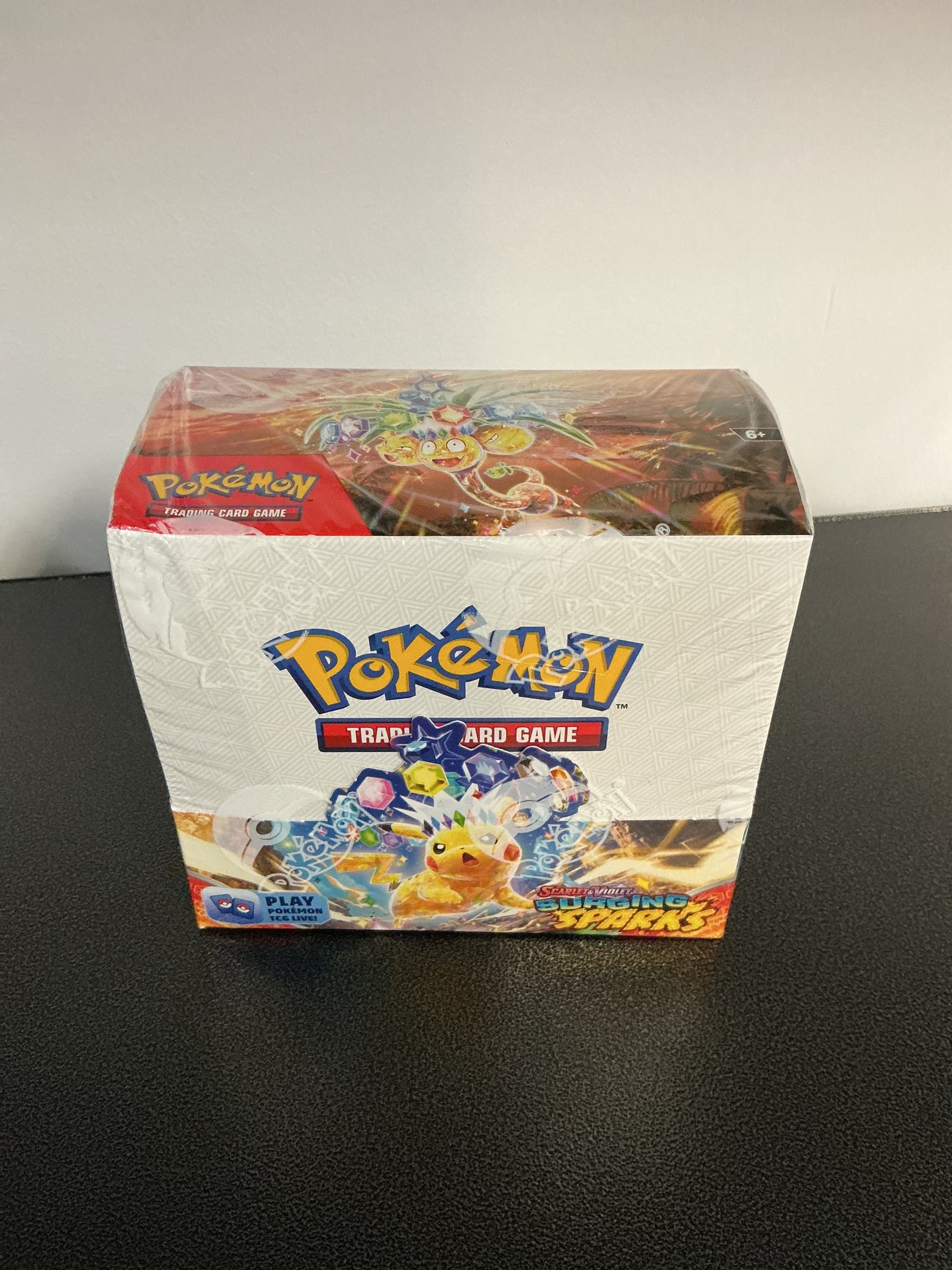 Surging Sparks booster box