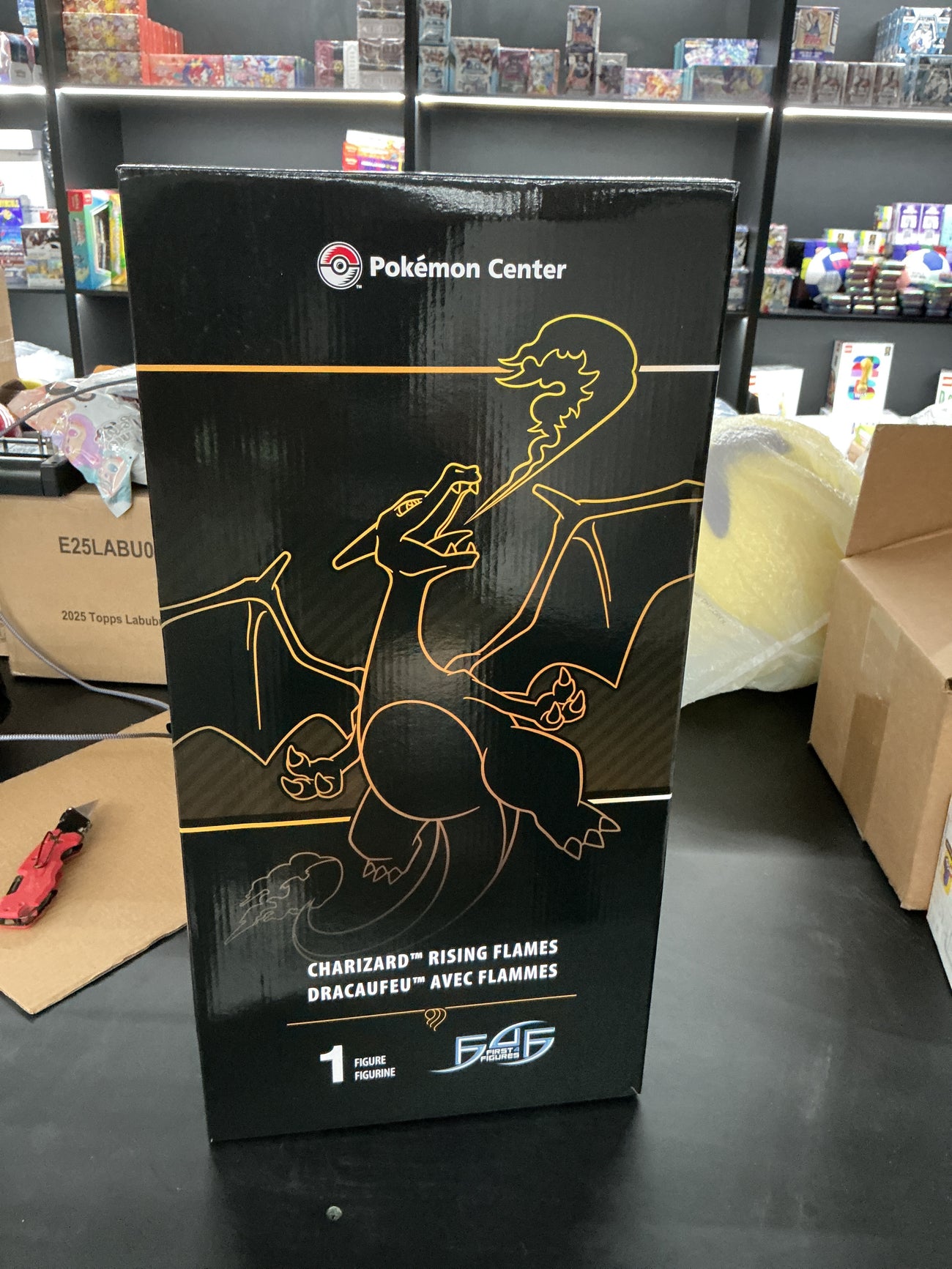Pokémon center Charizard rising flames statue