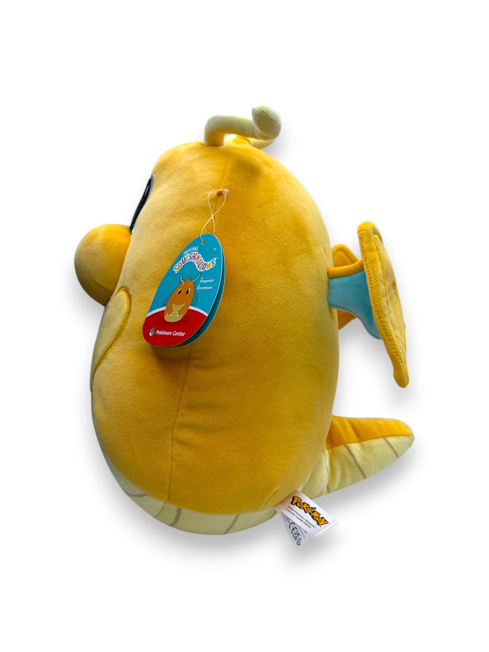 Lowkey Stock 14 inch Dragonite Squishmallows plush toy with ultrasoft yellow fabric and blue wing accents