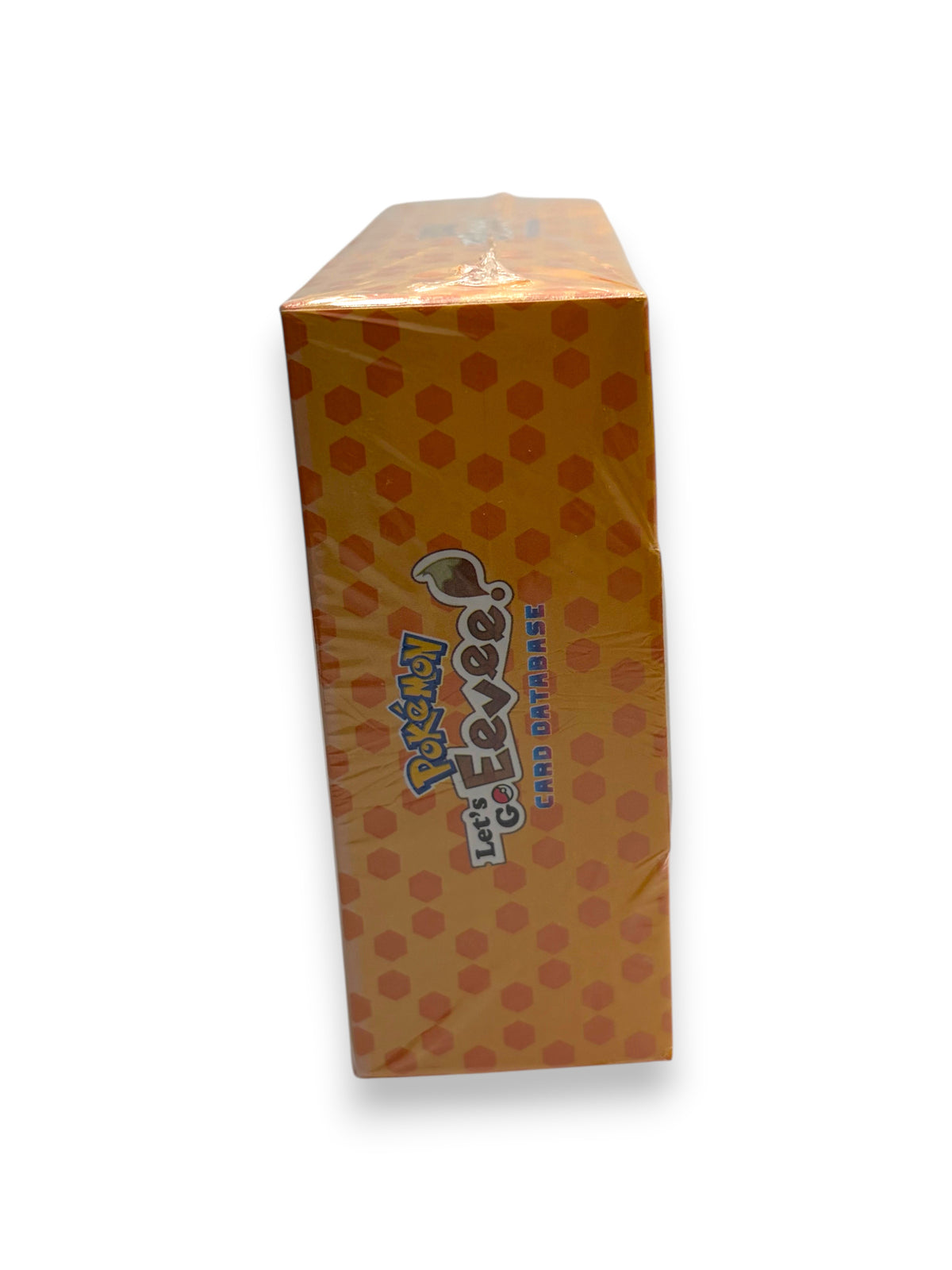 Lowkey Stock sealed Let's Go Eevee Pokémon card database box with orange honeycomb pattern side view