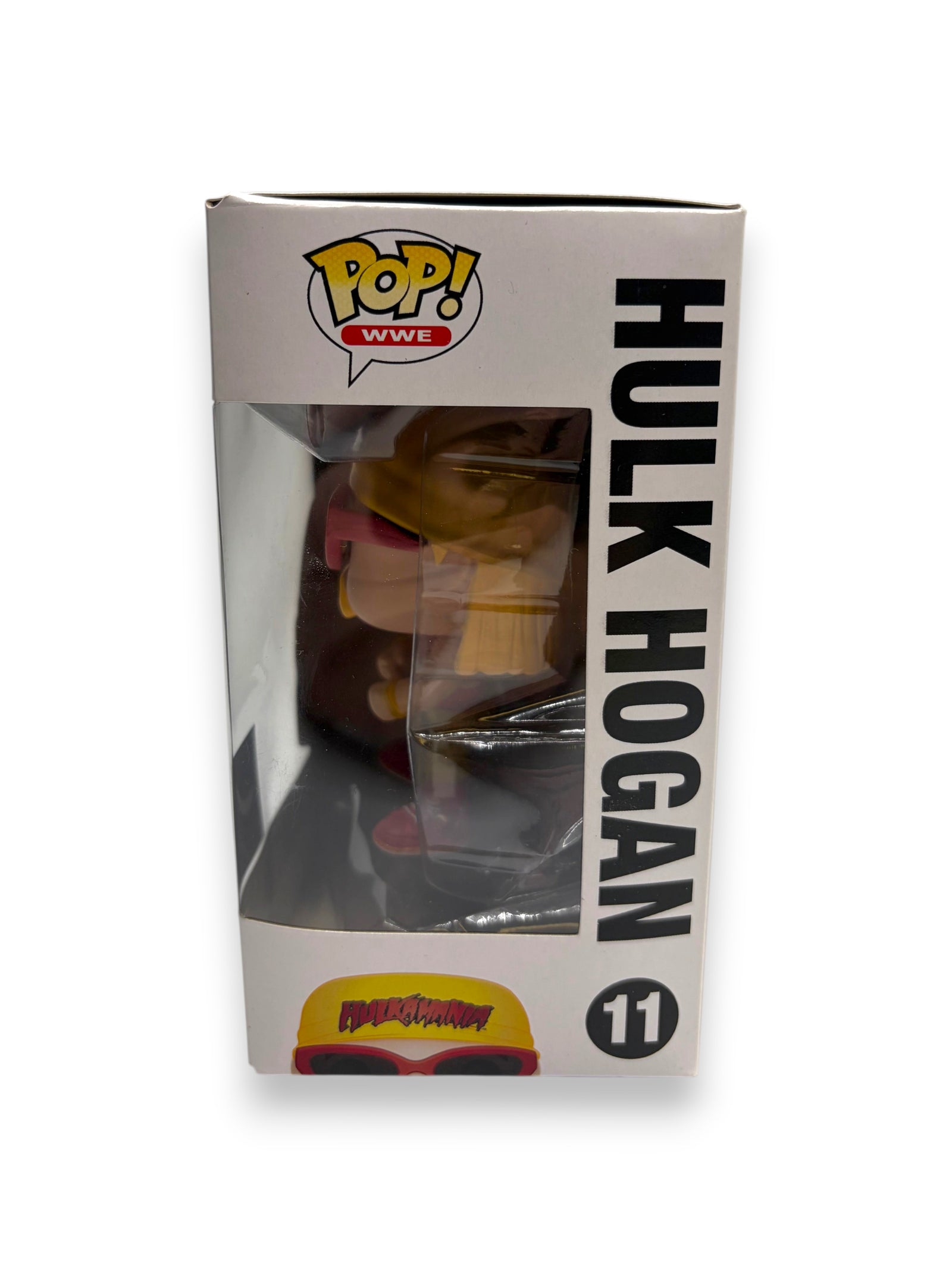 Lowkey Stock Funko Pop WWE #11 Hulk Hogan collectible figure in original window display box, side view