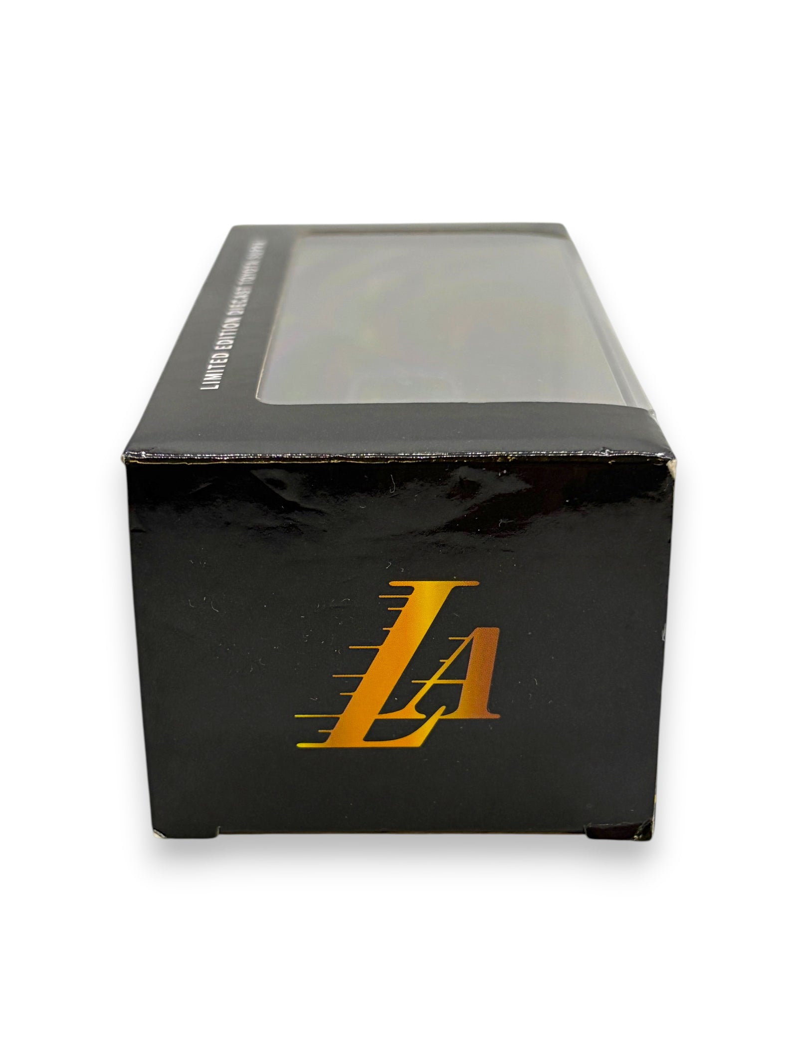 Lowkey Stock Lakers limited edition diecast Toyota Supra gold car collectible in black display box with LA logo