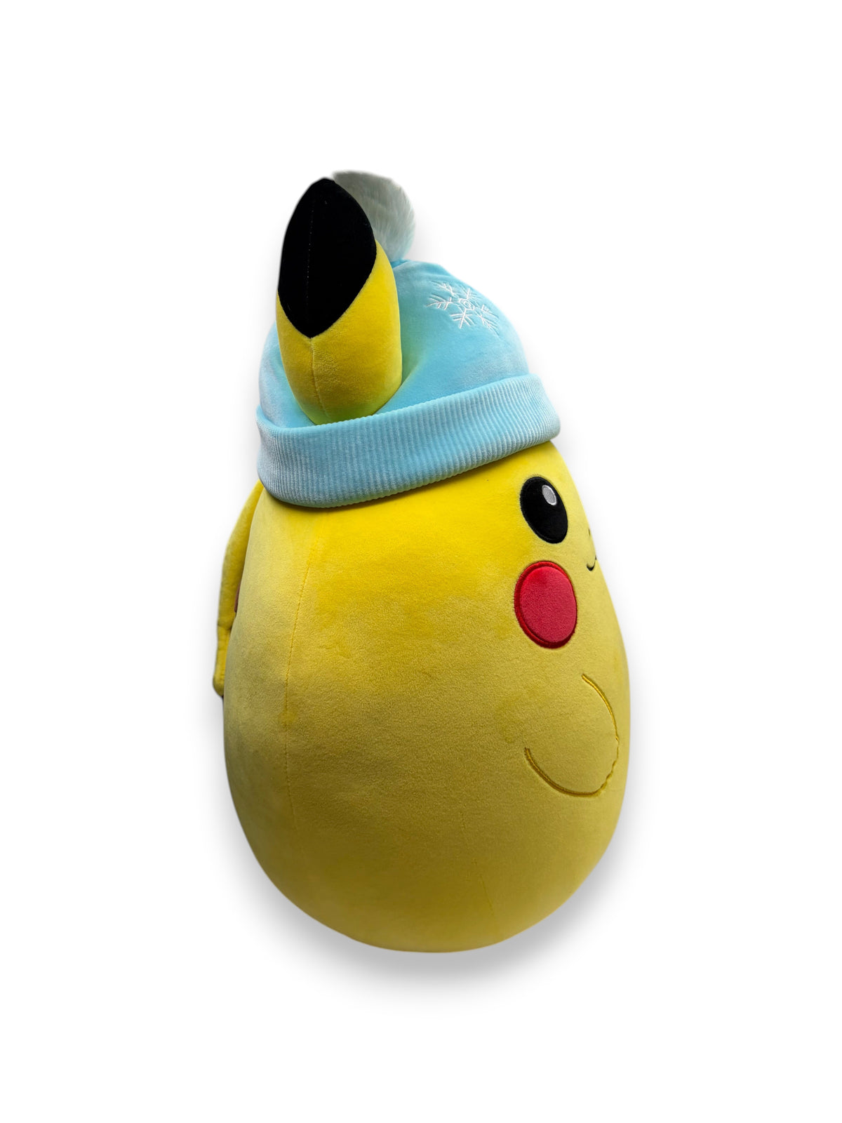 Lowkey Stock 20-inch Pikachu Squishmallow plush wearing a light blue winter hat with a snowflake design