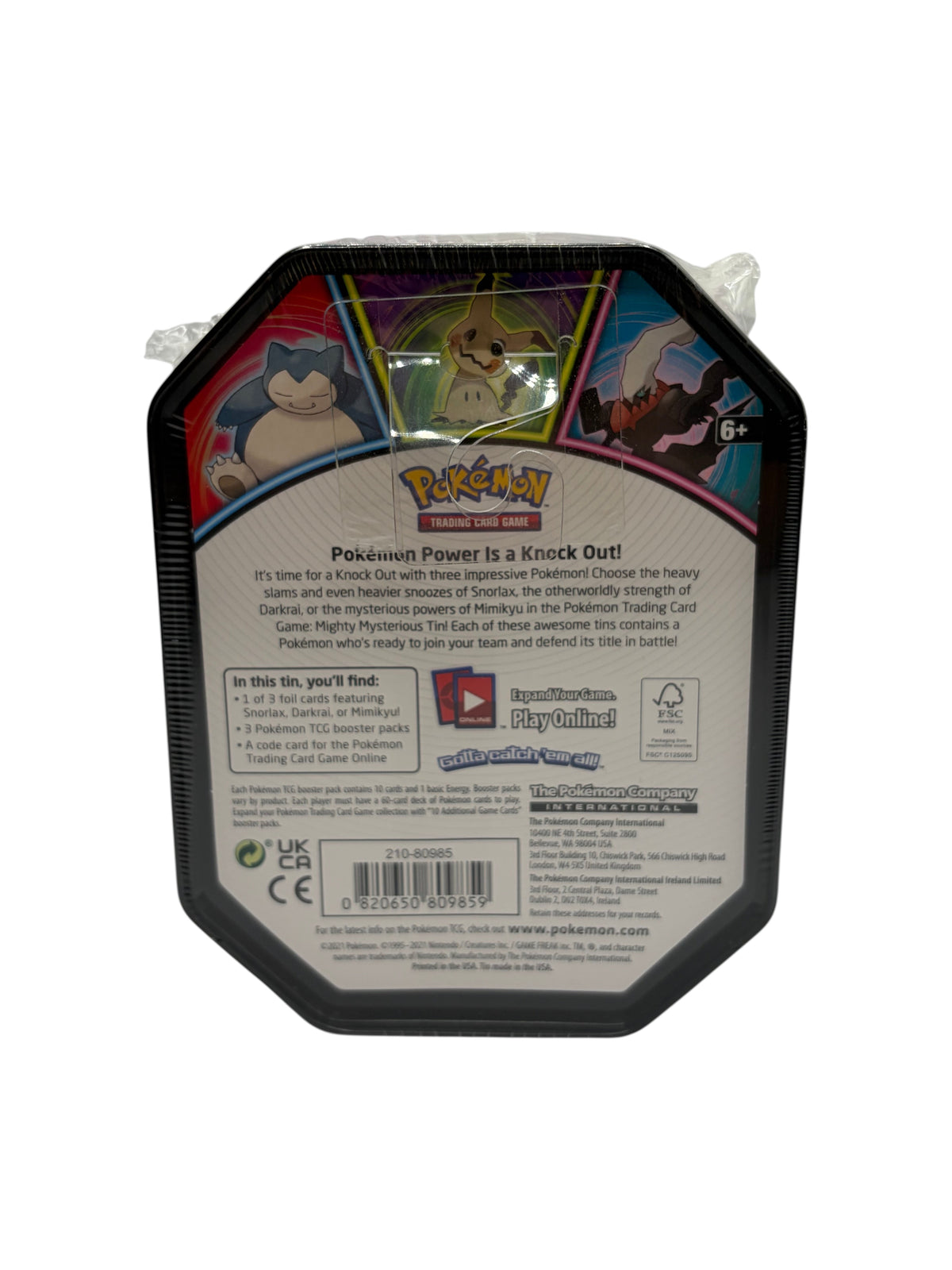 Lowkey Stock factory sealed Pokémon Mighty Mysterious Tin featuring Mimikyu, Snorlax, and Darkrai on the back label.