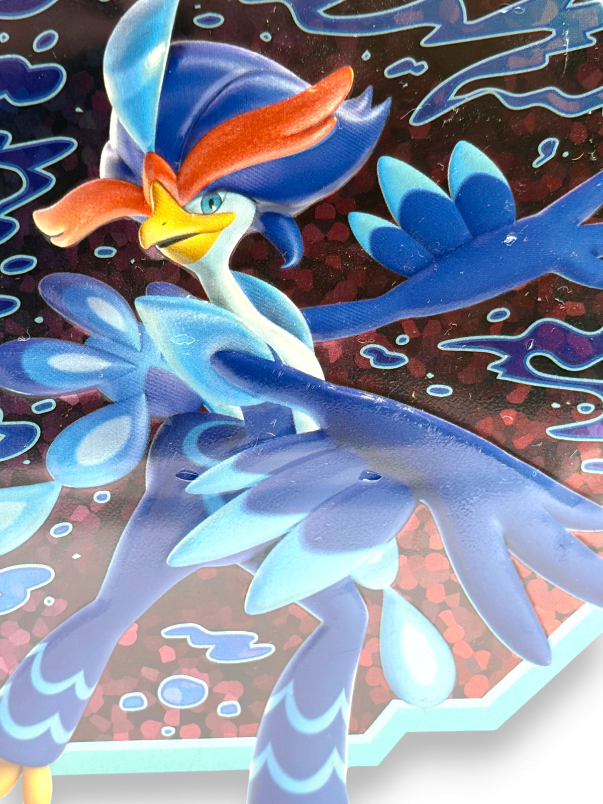 Lowkey Stock Pokemon TCG Paldea Partners Tin featuring Quaquaval ex artwork on a blue and dark patterned background