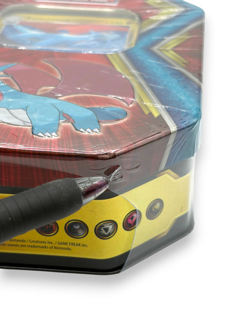 Lowkey Stock sealed 2019 Pokémon TCG Dragon Tin featuring Salamence with a small tear in the plastic shrink wrap