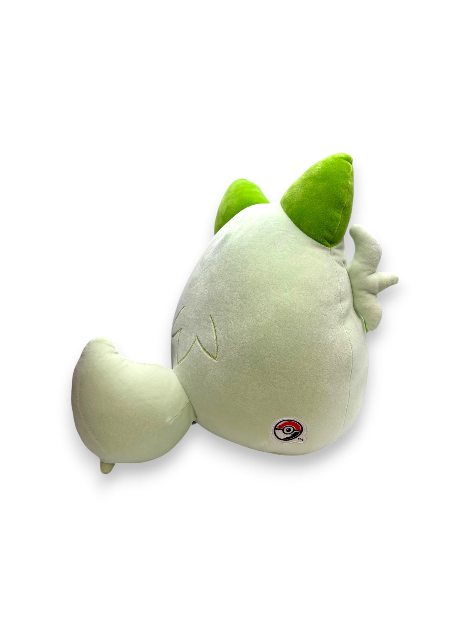 Lowkey Stock 14-inch Pokémon Center Sprigatito ultrasoft plush toy, back view showing green ears and tail