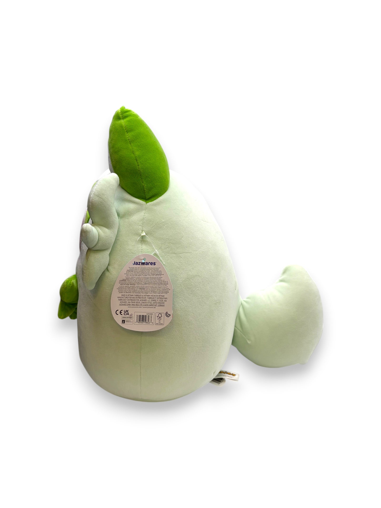 Back view of a 14-inch Lowkey Stock Pokémon Center Sprigatito ultrasoft plush toy with green accents and tag