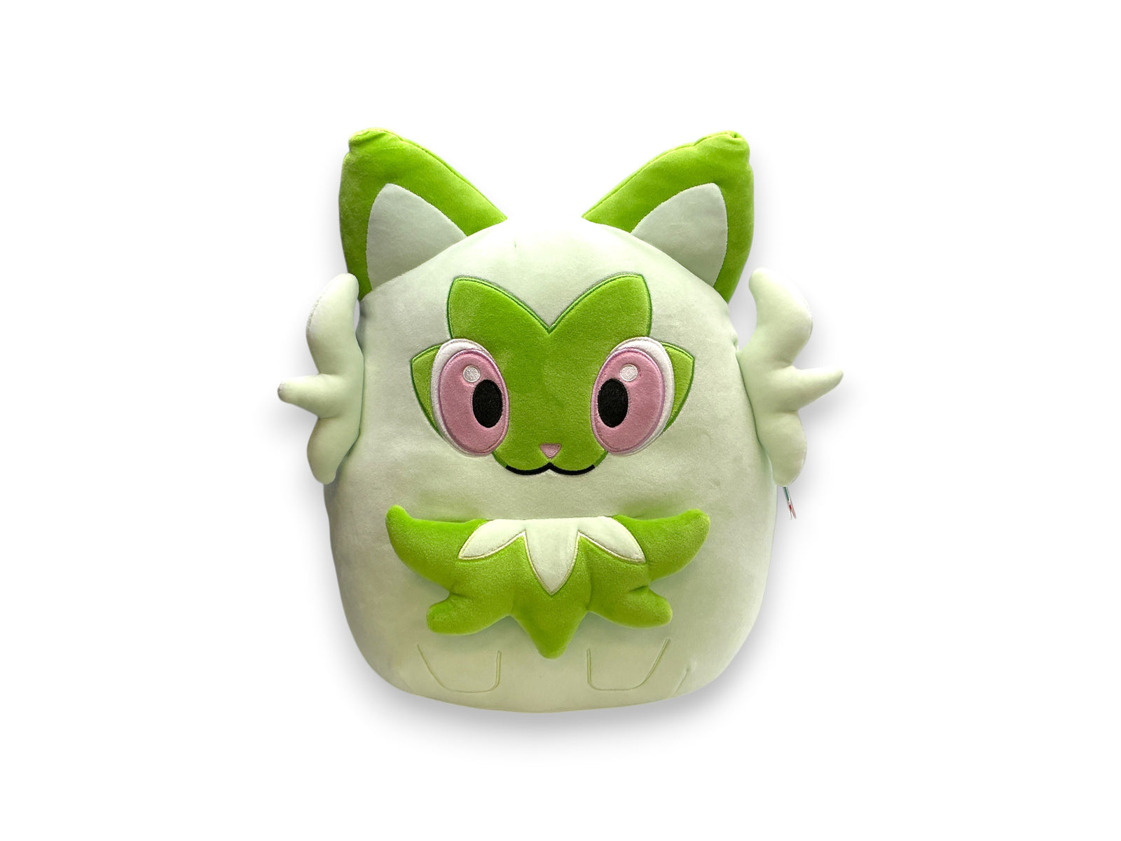 Lowkey Stock 14-inch Sprigatito plush toy from Pokémon Center featuring ultrasoft green fabric and pink eyes.