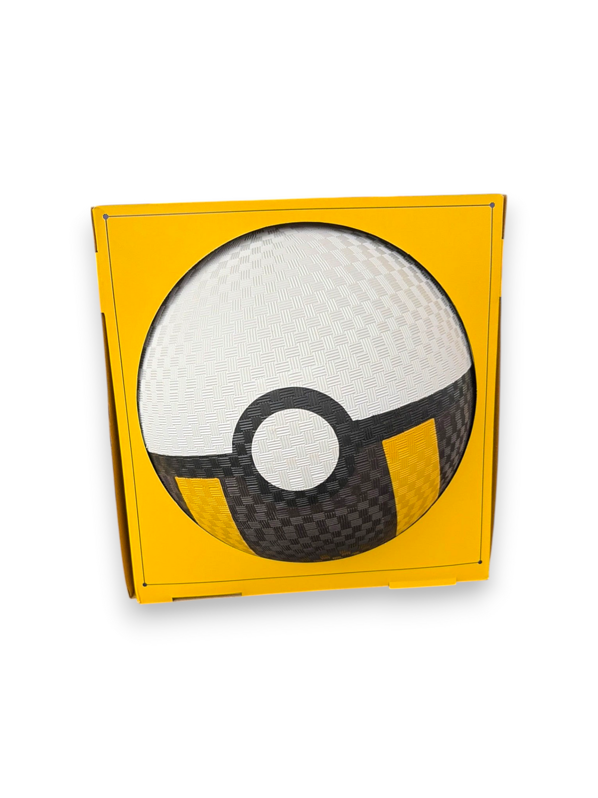 Lowkey Stock Ultra Ball Pokemon x Target kick ball in yellow square display box with textured black and white design